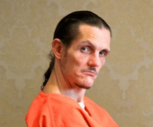 Edwin Tobergta looking dashing in prison orange